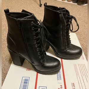 Soda brand heeled combat zipper boots